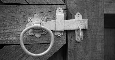 Which gate hardware actually prevents sagging on a heavy wood gate, and how do I pick hinges and latches that last?