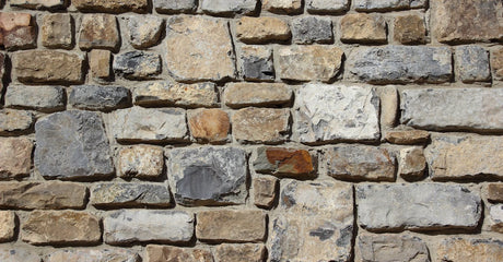 Treated Lumber Retaining Wall vs Segmental Block: Cost, Lifespan, and Code Considerations